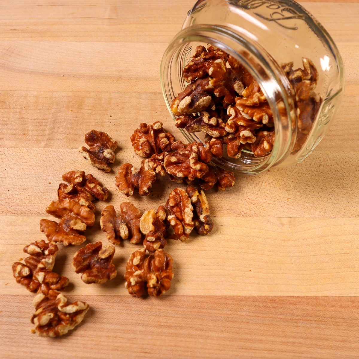 toasted walnuts in a jar
