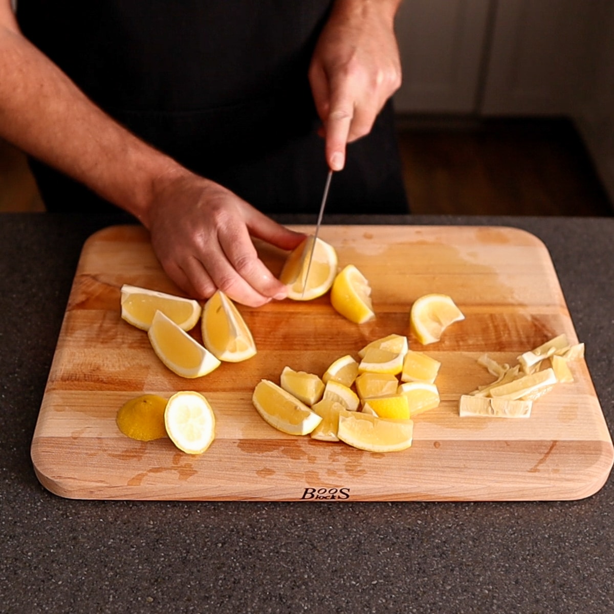cutting lemons into wedges
