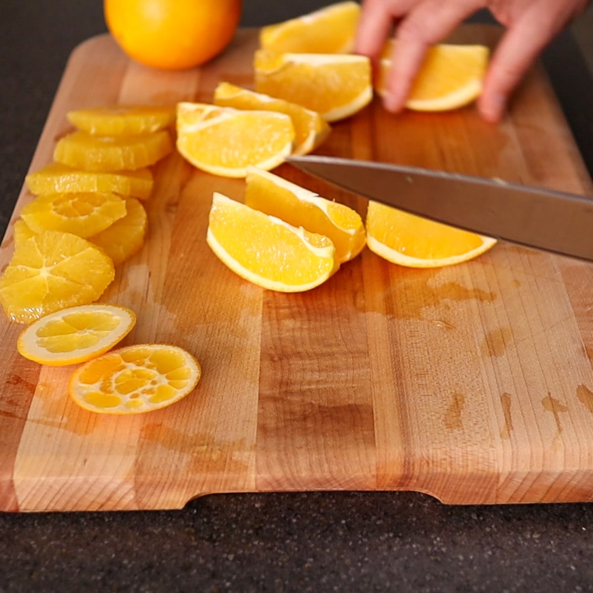 cutting oranges into wedges
