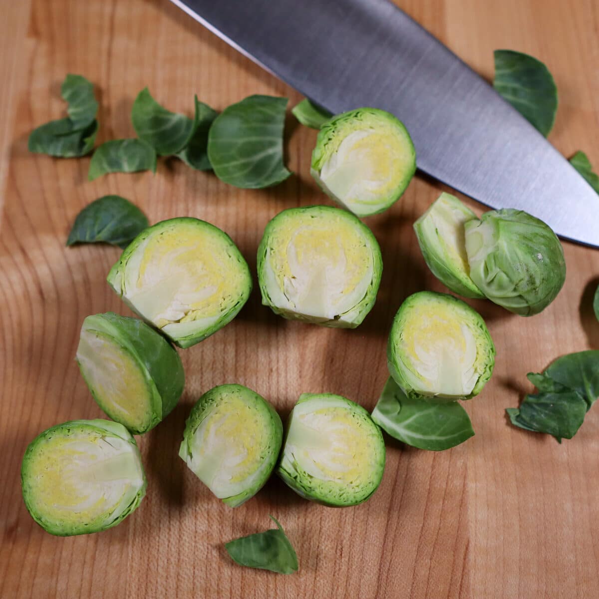 brussel sprouts cut on a board