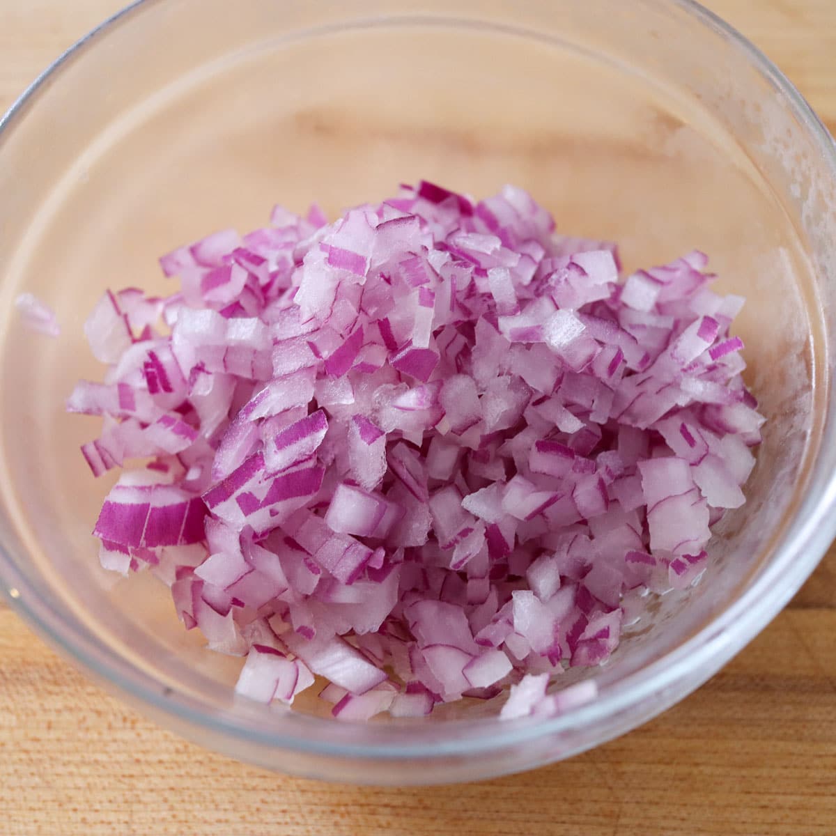Diced red onion in a bowl