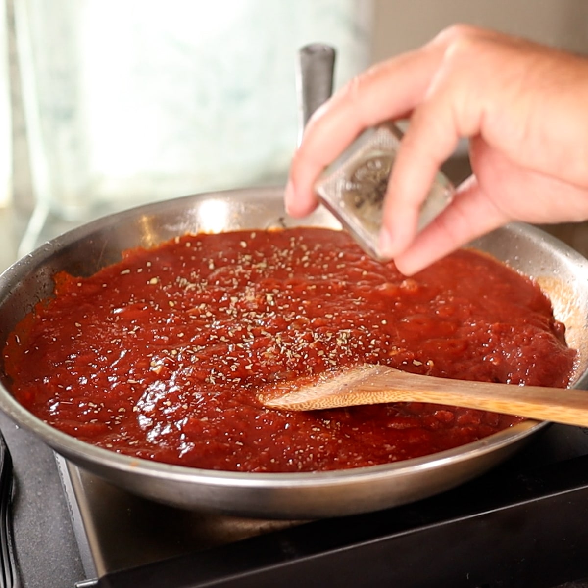 making a meat sauce in a frying pan