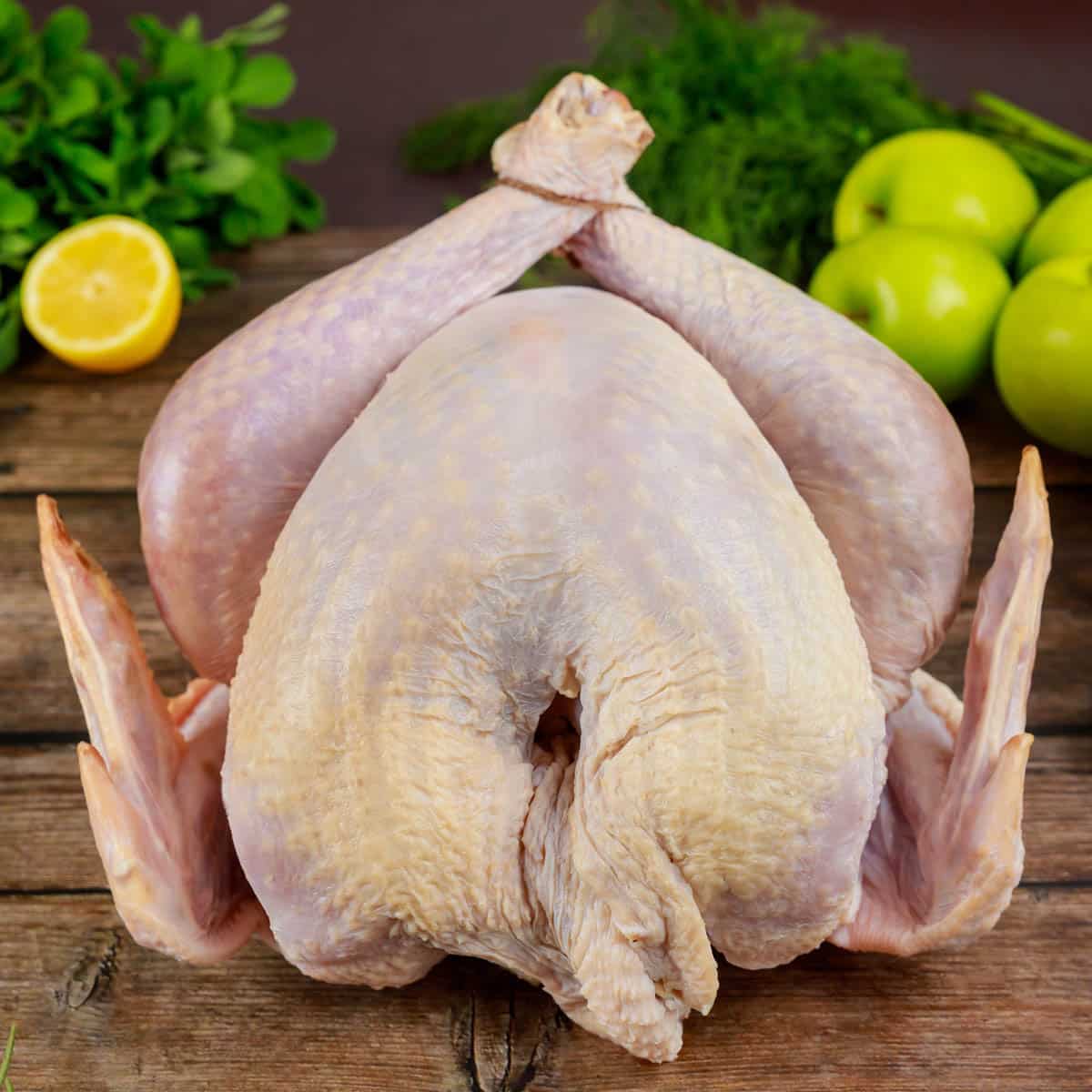 raw turkey on a cutting board
