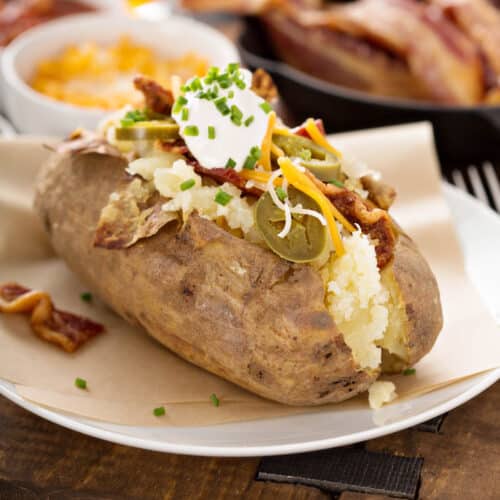Loaded baked potato with cheese, bacon and jalapenos.